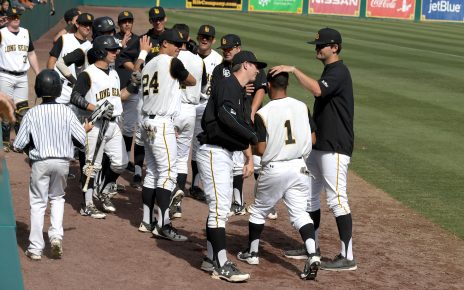 Long Beach State's Troy Tulowitzki, left, celebrates with